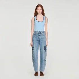 Palm-embroidered wide barrel jeans